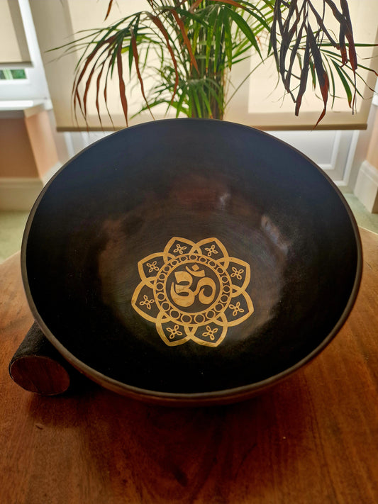 Inside view of black OM Tibetan singing bowl 9 inch